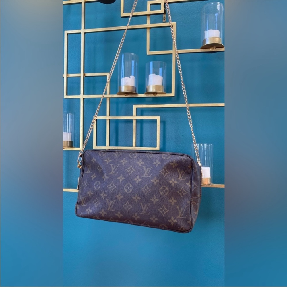 LV shoulder bag.